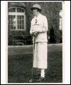 Ada Mackenzie standing with her golf club