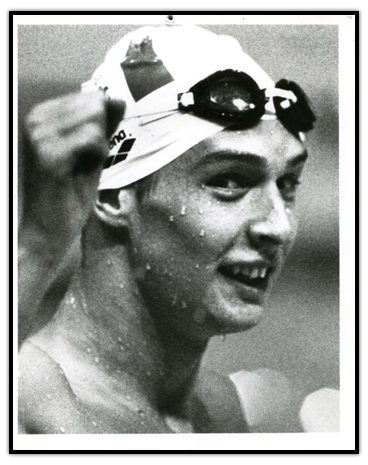 Alex Baumann celebrates in the pool