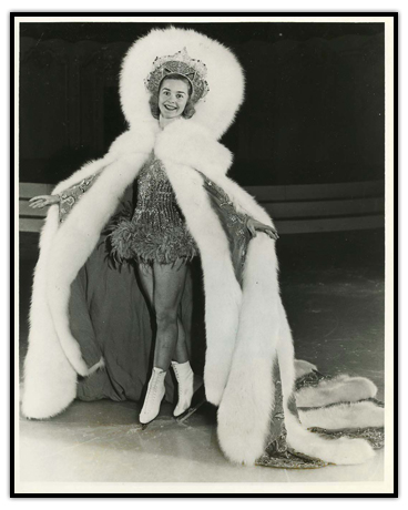 Barbara Ann Scott wears a large skating costume