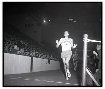 Bill Crothers crossing the finish line