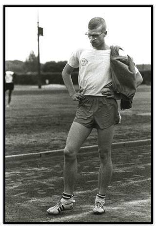 Bill Crothers standing on a track looking downward