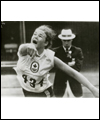 Diane Jones-Konihowski throwing a shot put