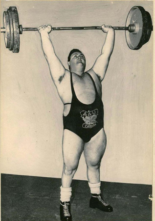 Doug Hepburn lifting weights.
