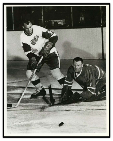 Gordie Howe (left) with goaltender Johnny Bower on the ice
