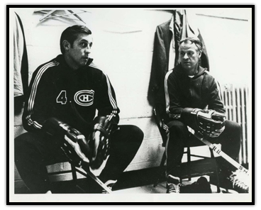 Jean Beliveau (left) sitting next to Gordie Howe in a locker room