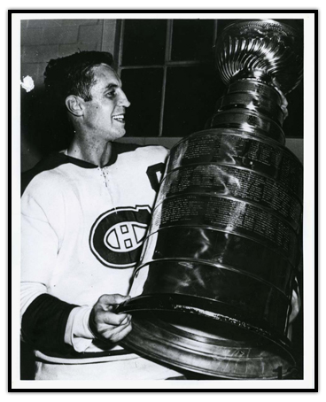 Jean Beliveau celebrating with the Stanley Cup