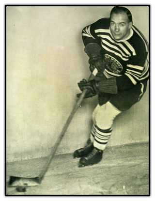 Lionel Conacher stickhandling the puck with the Chicago Black Hawks
