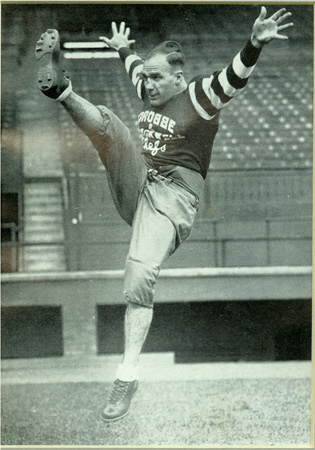 Lionel Conacher on a football field.