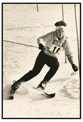 Lucile Wheeler skiing around a pole
