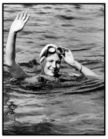 Marilyn Bell waving from the water