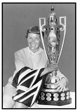 Marlene Streit with a golf trophy