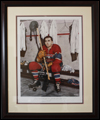 Maurice Richard in his uniform while sitting in the locker room