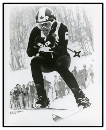 Nancy Greene skiing down a hill