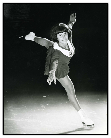 Petra Burka posing on the ice