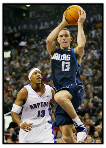 Steve Nash is in the act of shooting in a game against the Toronto Raptors
