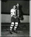 Syl Apps on the ice with the Stanley Cup
