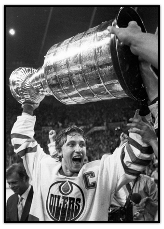 Wayne Gretzky raising the Stanley Cup over his head