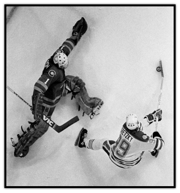Wayne Gretzky taking a backhand shot